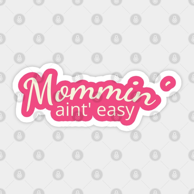 Mommin' aint easy Sticker by DIGITAL MERCH CREATIONS